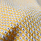 Close-up view of vintage women's silk shibori haori in pastel yellow tone.
