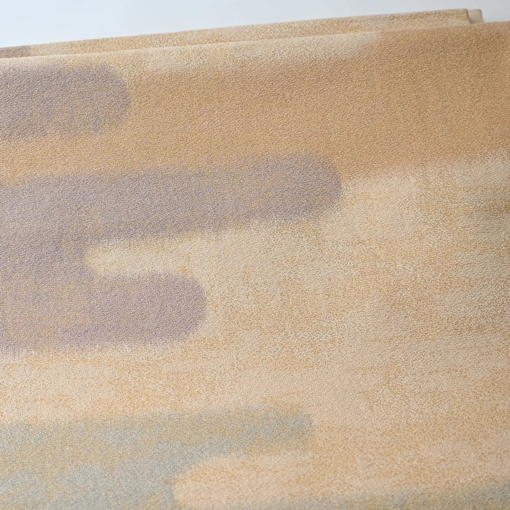 Close-up view of vintage Japanese women's silk Fukuro Obi in soft gold, purple and blue with Kasumi pattern.