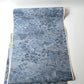 Vintage women's tsumugi silk kimono fabric in soft steel blue.