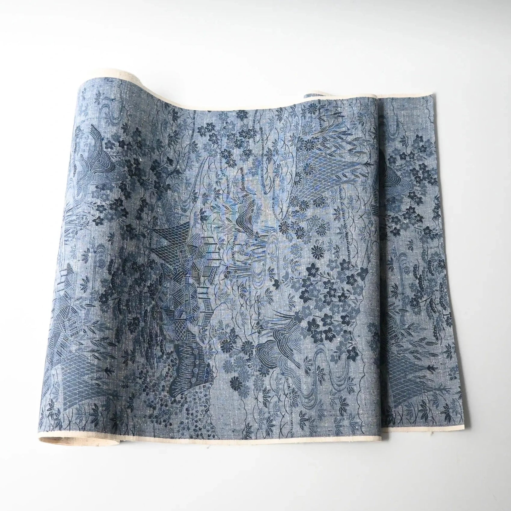 Vintage women's tsumugi silk kimono fabric in soft steel blue.