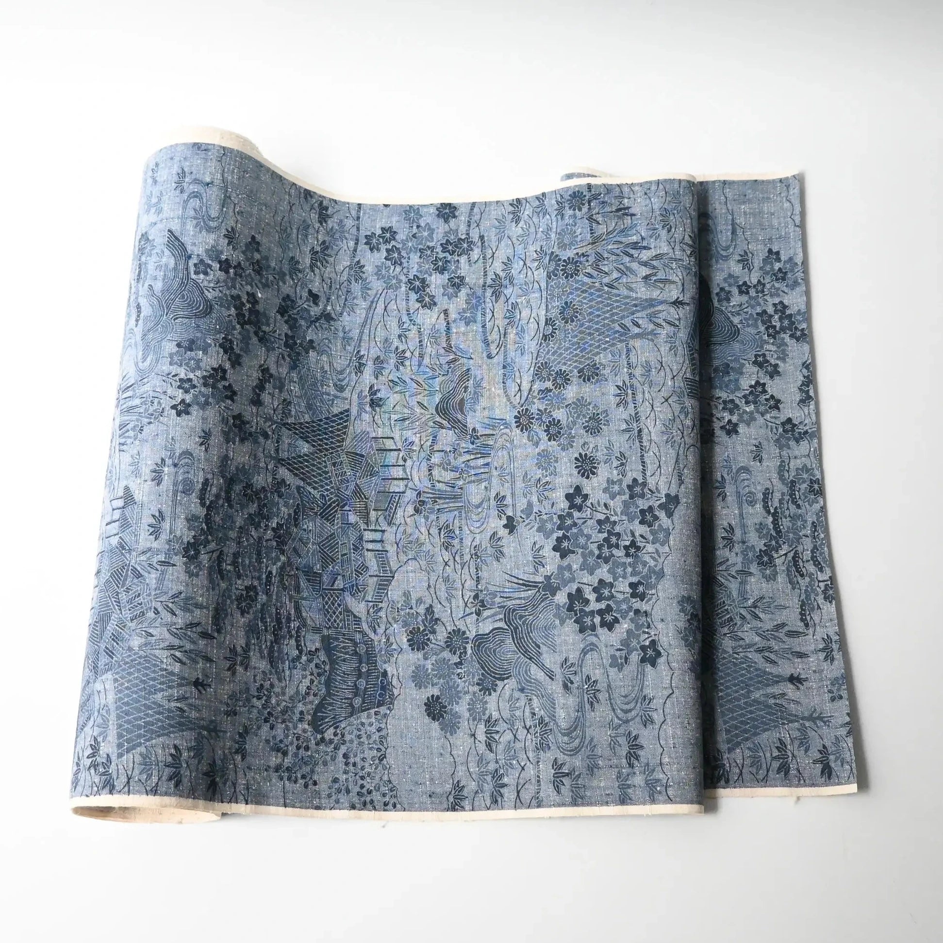 Vintage women's tsumugi silk kimono fabric in soft steel blue.