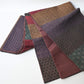Full view of vintage Japanese women's silk textured geometric design Fukuro obi in warm rustic tones.