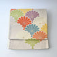 Vintage women's white silk fukuro obi with colourful chrysanthemum motif.