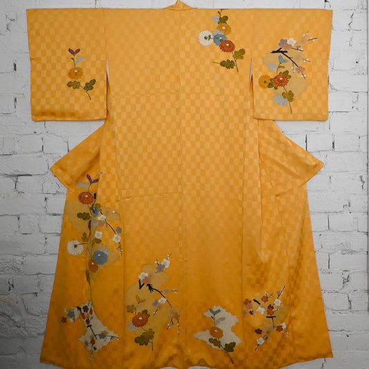 Vintage Japanese women's yellow silk jacquard semi-formal kimono with gorgeous chrysanthemum and plum blossom.