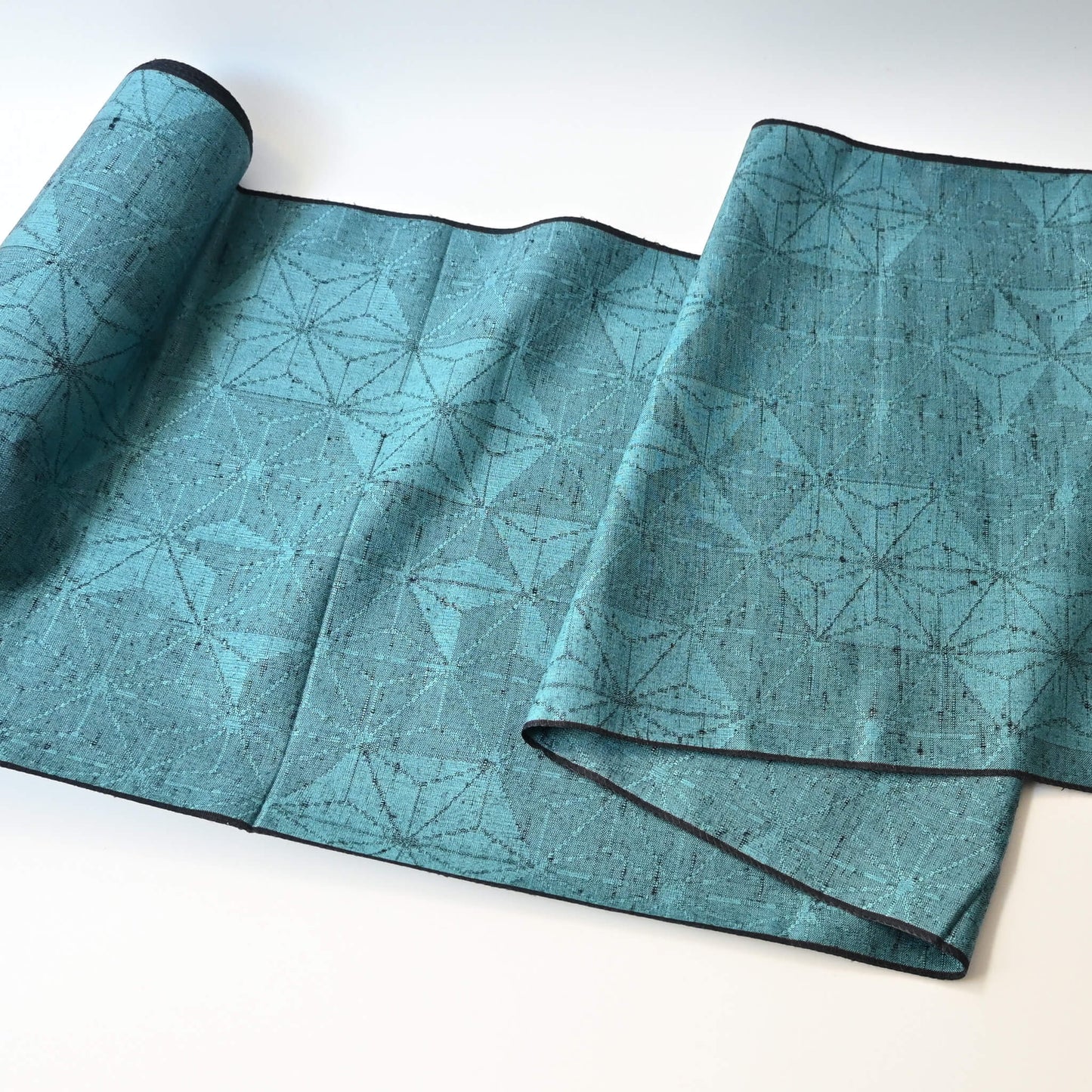 Vintage wool and silk blend kimono fabric in turquoise blue with asanoha motif, sold by the metre.