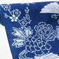 Close-up view of vintage traditional yukata cotton fabric with seasonal flowers, sold by the metre.