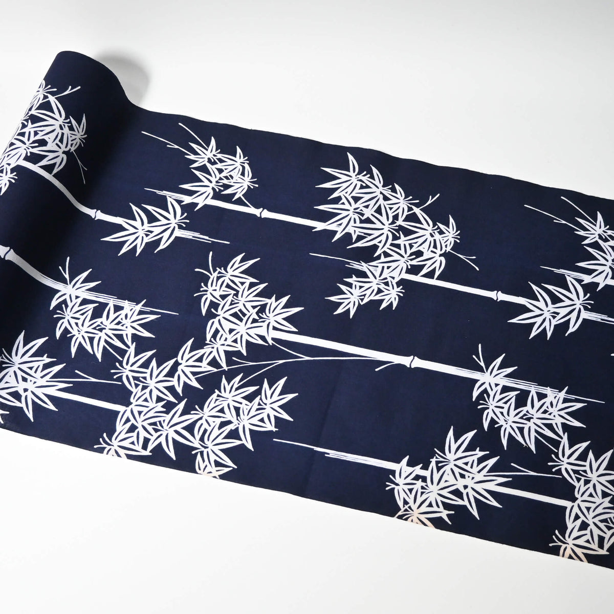 Vintage women's yukata cotton fabric with white maple motif on dark indigo base, sold by the metre.